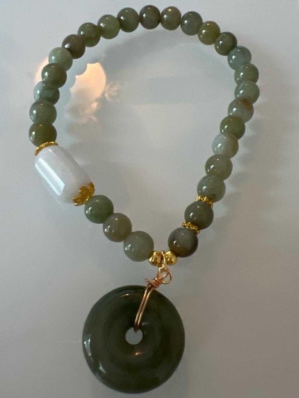 Green Jadeite Bead Bracelet with White Accent and Gold Details